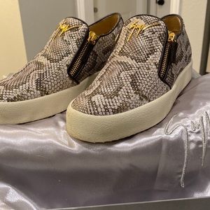 Giuseppe Zanotti snake skin looking sneaker. Cream color sole very gently worn.